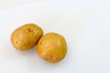 Potato. Raw fresh organic potato isolated on a white background with copy space.