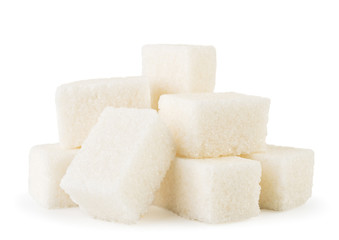 Heap of refined sugar close up on a white. Isolated.