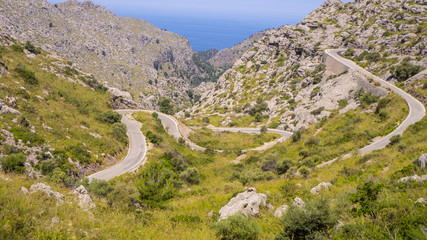 Fototapeta na wymiar Mallorca, Spain. The panoramic and tourist road leading to the port of Sa Calobra. Winding and narrow road