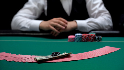 Risky bluff investment man putting money and chips on victory gambling business