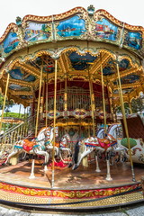 vintage carousel with horses