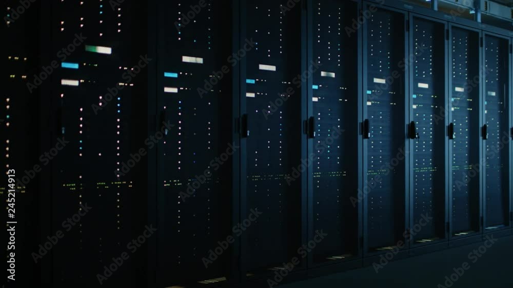 Poster Moving Data Shot of Dark Data Center With Multiple Rows of Fully Operational Server Racks. Modern Telecommunications, Cloud Computing, Artificial Intelligence, Database, Supercomputer