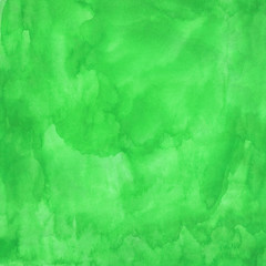 Abstract green watercolor background with texture aquarelle paint and paper. Empty surface of square format with grunge effect for your text or collage.