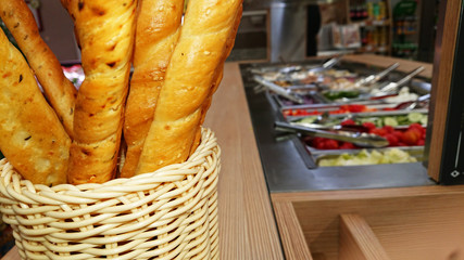 Concept of selling unhealthy food by weight in a store. Vegetables, fruits, meat, salad.