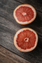 Fototapeta na wymiar Close up freshly harvested grapefruit on wooden background
