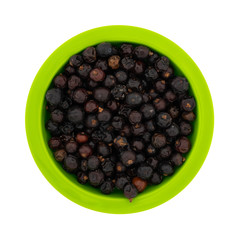 Top view of a bowl filled with juniper berries