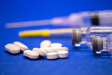 Medicine and drug concept.  Closeup of flu, hpv, shot vaccine injection and syringe with needle for vaccination or treatment diseases isolated on white background, 