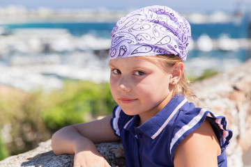 Cute Caucasian little girl in bandanna