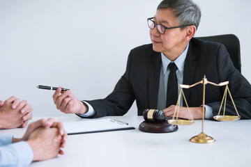 Unhappy divorce couple having conflict, husband and wife during divorce process with senior male...