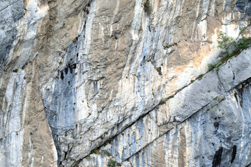 Dolomite rock or dolostone textures and layer in different colours. 