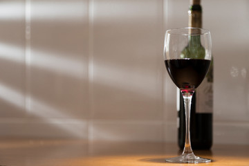 glass of red wine on the table