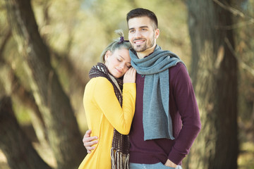 Young happy holding each other in park