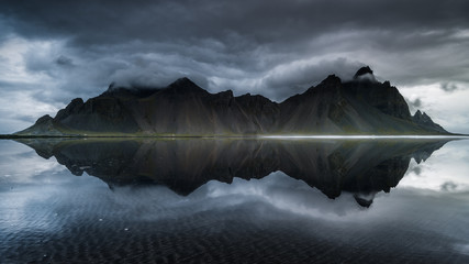 Scenic view of Vestrahorn mountain range reflection in lake