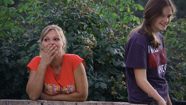 Portrait of two young female friends in park