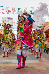 Oruro canival procession and masked dancers in  Bolivia