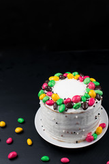  Cake with butter cream and sweets