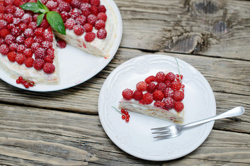 Raspberry cake on wooden table