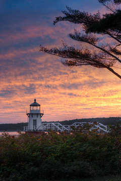 Doubling Point Lighthouse With Walkway and Tree in Sunset