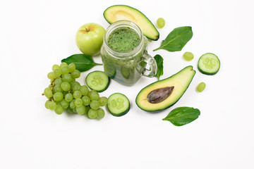 Detox time. Green fruits and vegetables on a white background.