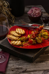 Traditional dinner in a country house. Meat with vegetables and bread. Hearty and tasty dish.Menu background for cafe and restaurant. Place for text.