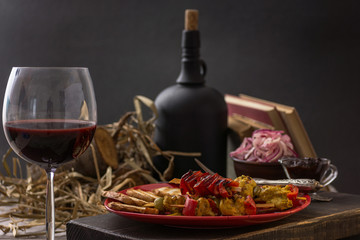 Traditional dinner in a country house. Meat with vegetables and bread. Hearty and tasty dish.Menu background for cafe and restaurant. Place for text.