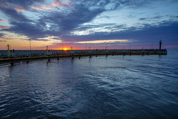 Epic sunset at seaside with dramatic sky