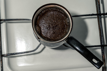 Turkish coffee is on the stove