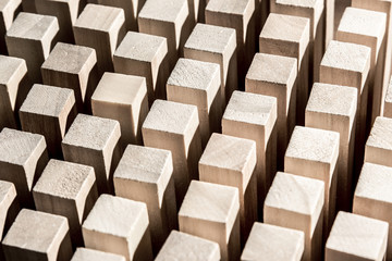 Risk and strategy in business, many identical wooden blocks