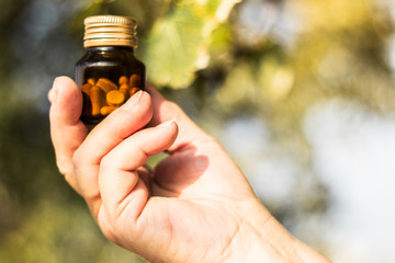 Medication in hand