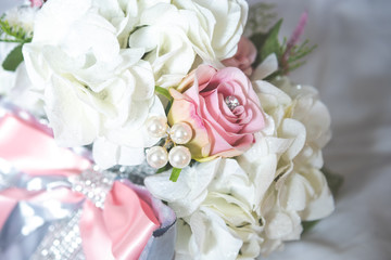Bridal flowers bouquet with roses and ribbon