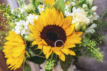 bridal Sunflower bouquet displaying ring