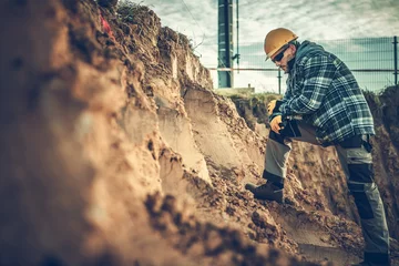 Foto op Canvas Worker Checking on a Soil © Tomasz Zajda