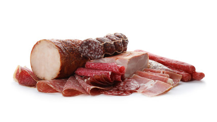 Different tasty meat delicacies on white background