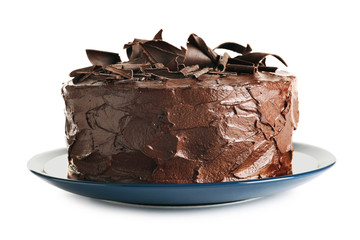 Plate with tasty homemade chocolate cake on white background