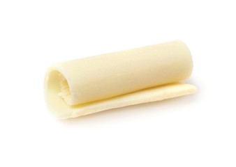 Yummy chocolate curl for decor on white background