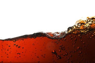 Closeup view of tasty refreshing cola on white background