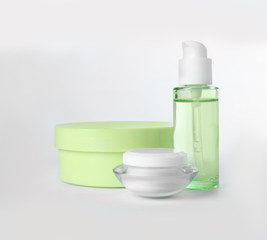 Different body care products on white background