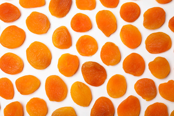 Flat lay composition with dried apricots on  white background. Healthy fruit