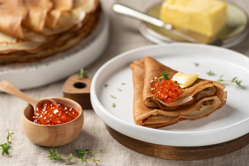 Russian pancakes with red caviar