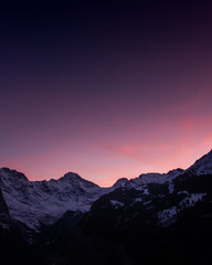 Alpine glow sunet over the Jungfrau mountains of Switzerland - 245256798