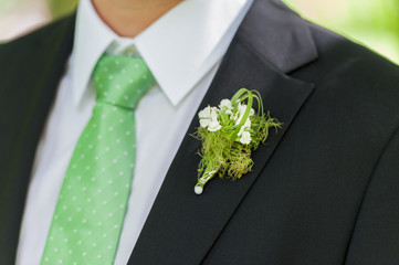 Flower on groom suit