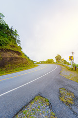 Curve road signs on down hill. Many warning sign indicating for safety