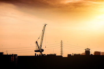 Construction site with cranes against