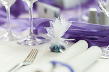 Green and purple candy on a arranged table