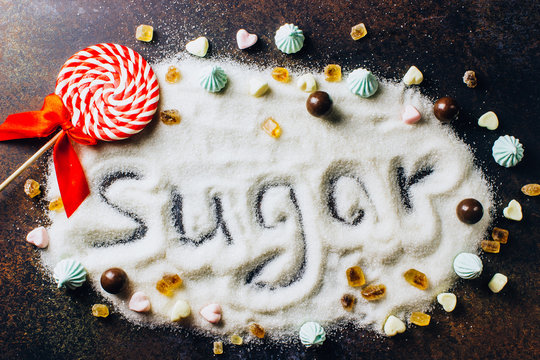 mix of sweet candy with sugar spread and written text