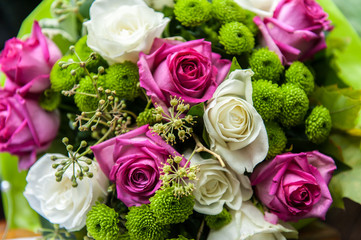 Pink and white roses in aflower bouquet