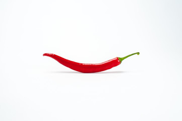 Red chilli on white background