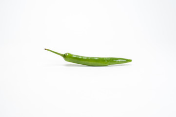 Green chilli on white background