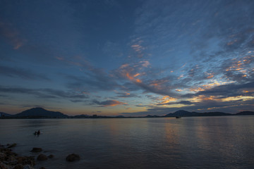 The background of the blue sky, natural wallpaper, the lake, has the atmosphere of the wind and the beautiful morning sun, seen during travel