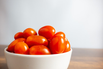 Tomatoes on wooden table